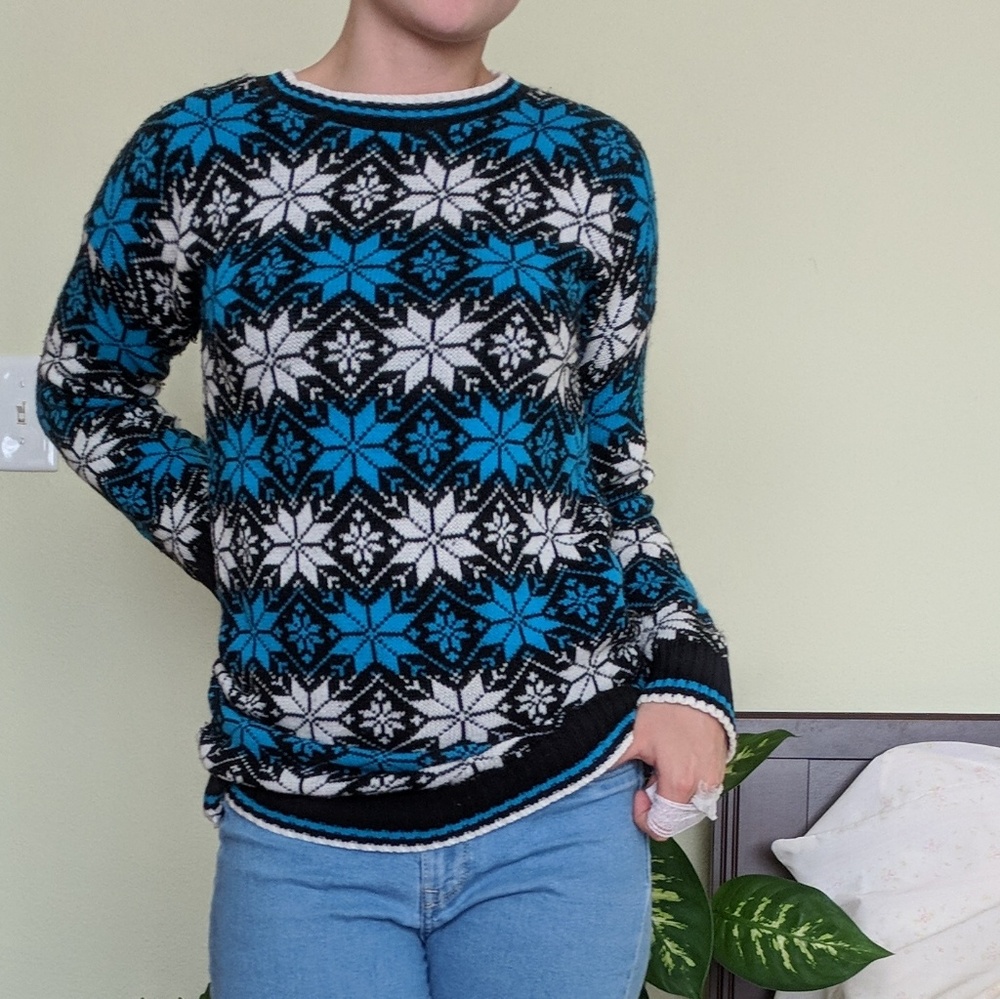 Winter sweater with snowflake pattern